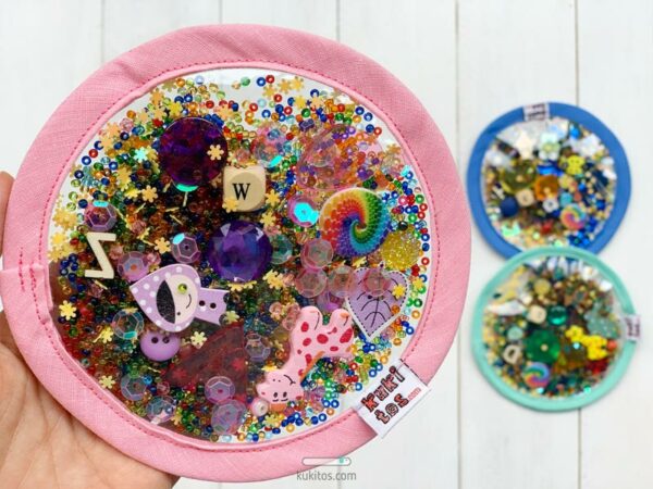 Caleidoscopio seguro con el borde rosa bebé para el cesto de los tesoros Montessori